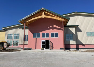 Completed commercial building exterior for Lengefeld, with timber-trussed roof structure.